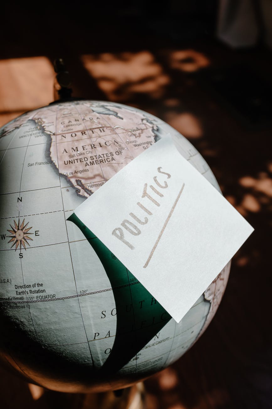 a politics text posted on a globe