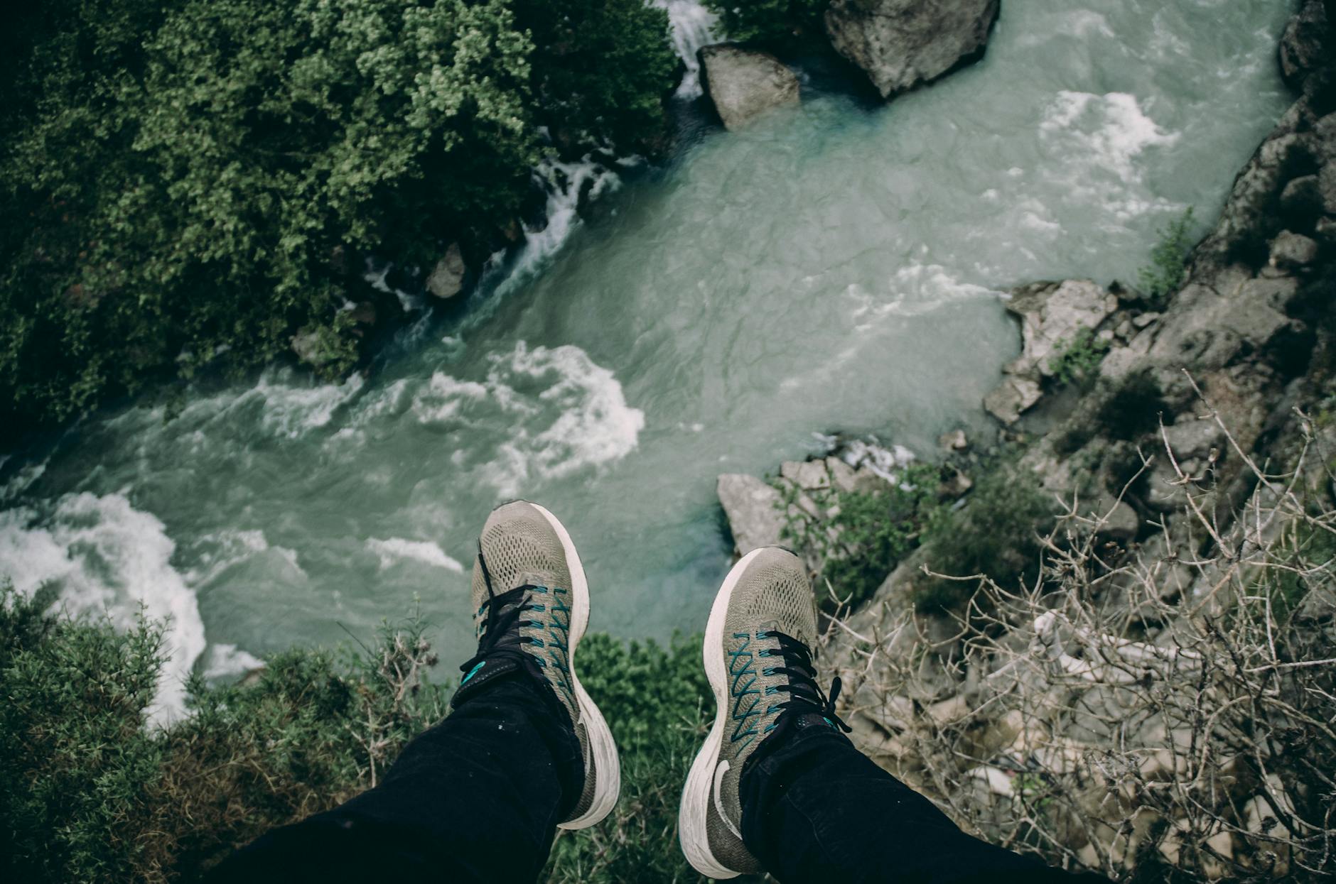 person by the cliff